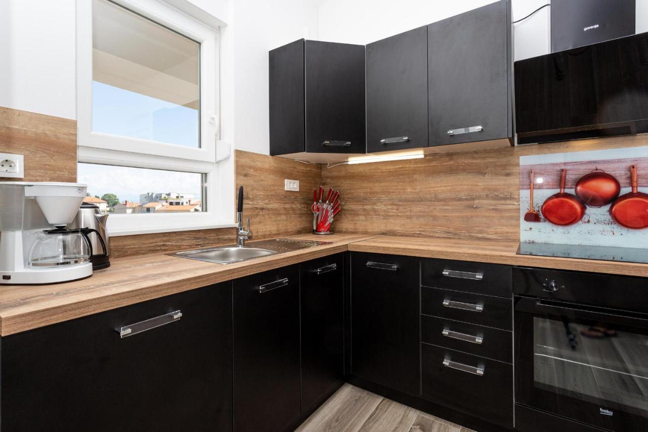 Apartments Doris Малинска Экстерьер фото