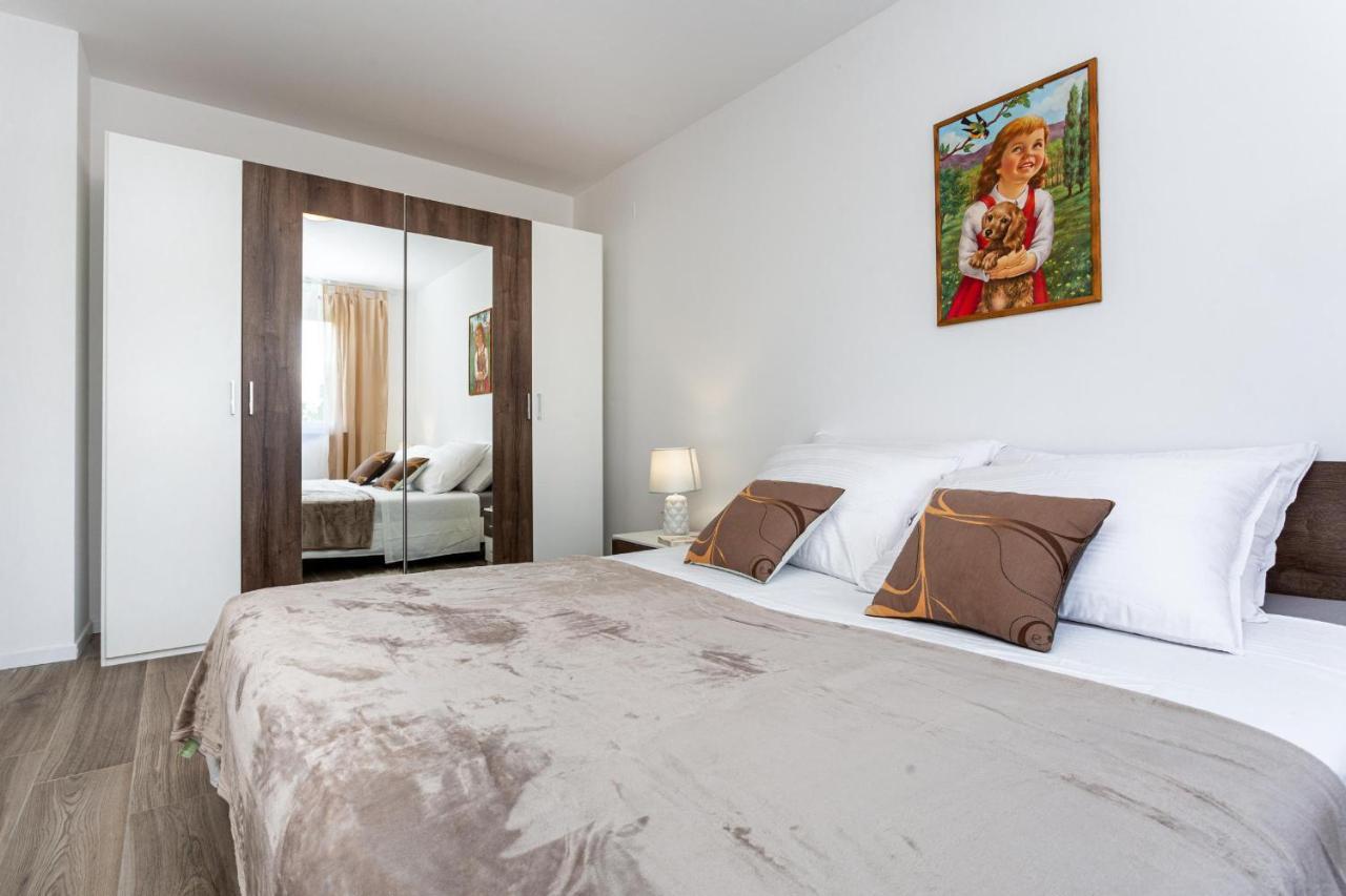 Apartments Doris Малинска Экстерьер фото